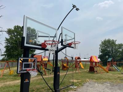 Goalrilla basketball hoops with junior hoop, hoop light, and yard guard attachments